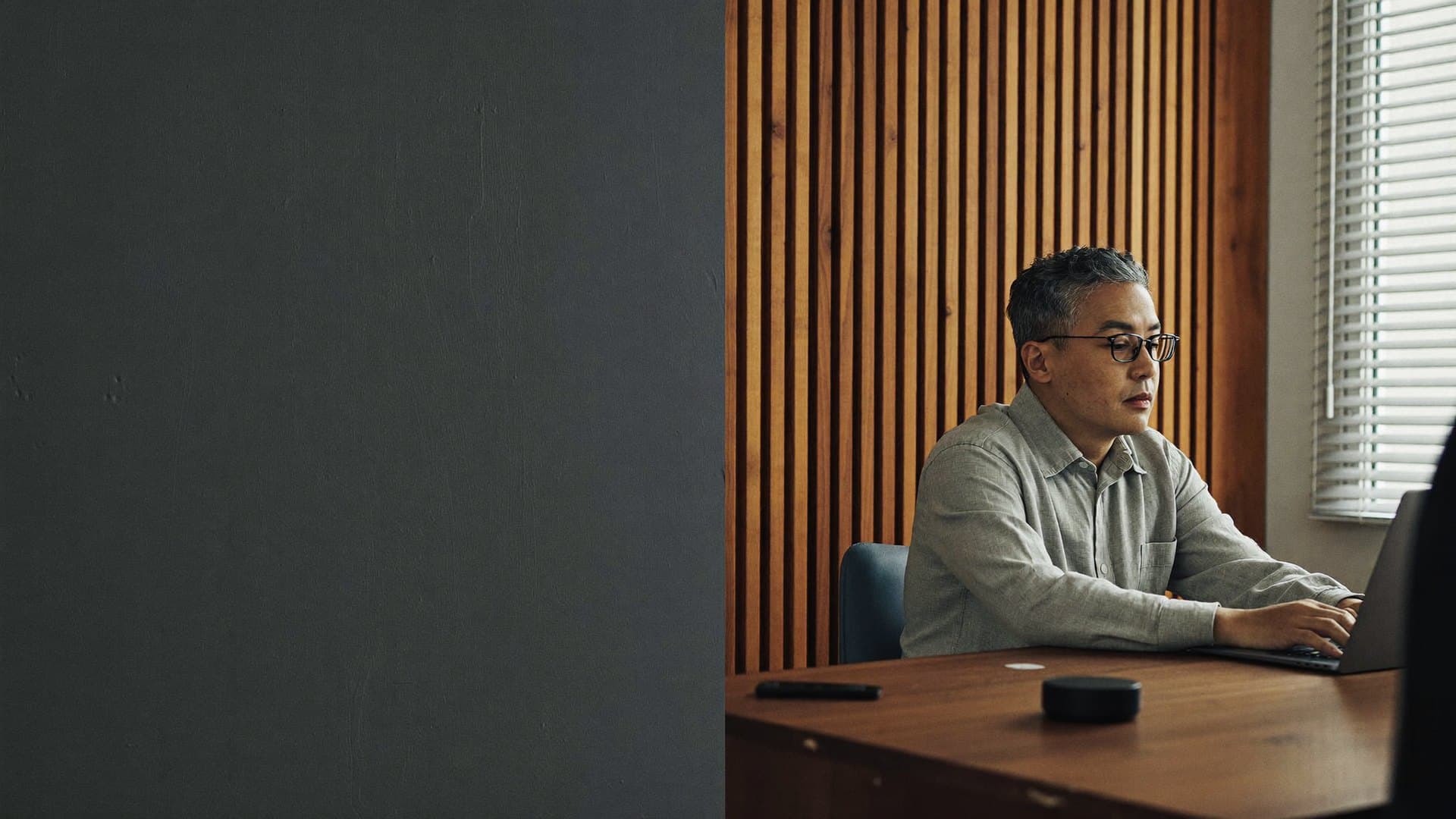 Finance director reviewing figures on a laptop